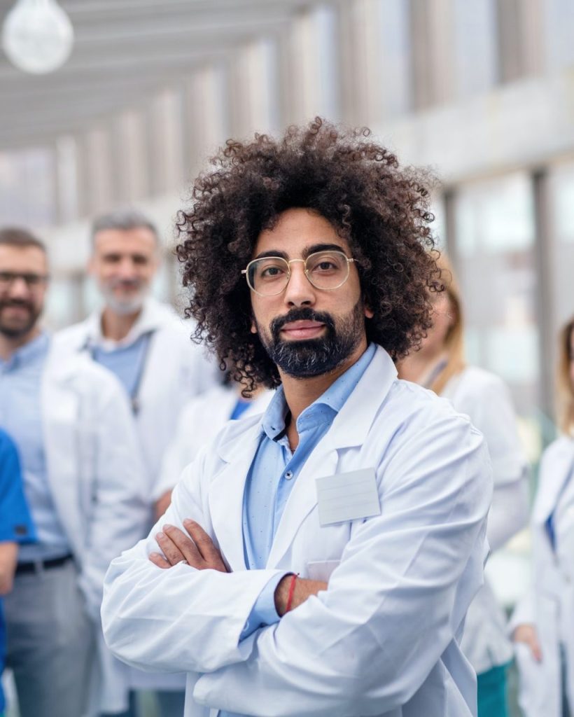group-of-doctors-standing-in-corridor-on-medical-conference-e1623252293962.jpg group-of-doctors-standing-in-corridor-on-medical-conference-e1623252293962.jpg